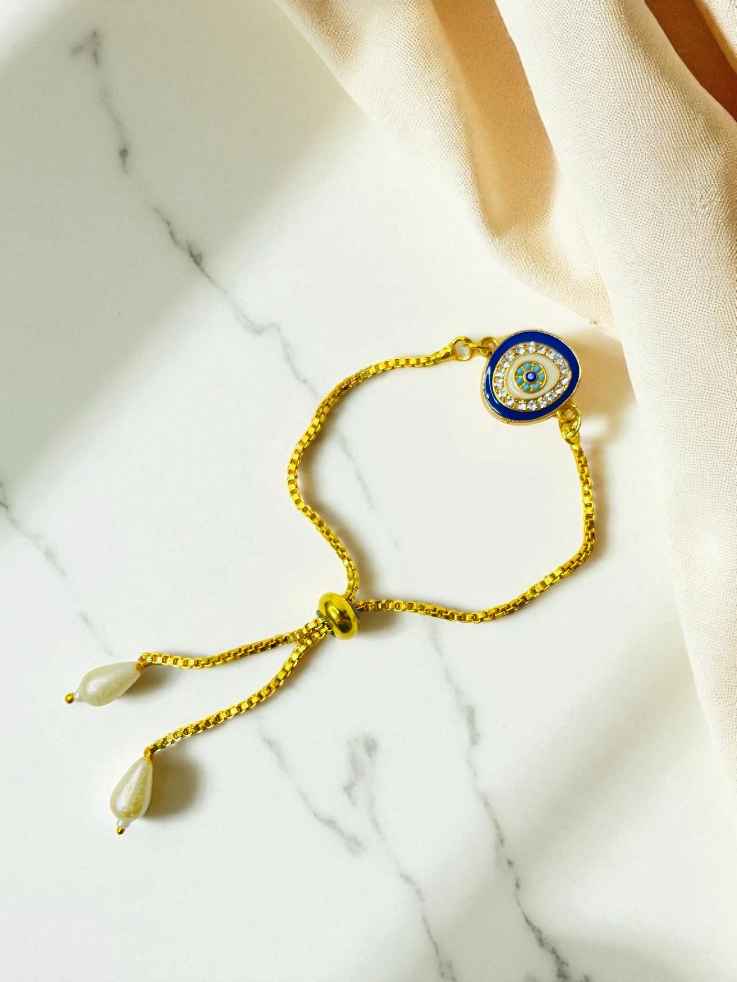 Divine Protection Rakhi for Sister – Evil Eye Bracelet by Shubh Aagman